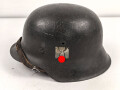 Heer, Stahlhelm Modell 1942. In allen Teilen original , das Innenfutter vermutlich in der Zeit gewechselt, früher Kinnriemen ergänzt, das Hakenkreuz vollständig erhalten. Hersteller EF 64. Ungereinigt