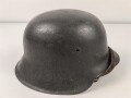Heer, Stahlhelm Modell 1942. In allen Teilen original , das Innenfutter vermutlich in der Zeit gewechselt, früher Kinnriemen ergänzt, das Hakenkreuz vollständig erhalten. Hersteller EF 64. Ungereinigt
