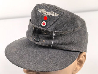 Luftwaffe, Feldmütze Modell 1943 für Mannschaften. Späte, " leichte " Ausführung. Leicht angeschmutzt, Kopfgrösse gemessen 54