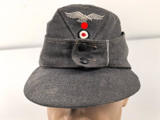 Luftwaffe, Feldmütze Modell 1943 für Mannschaften. Späte, " leichte " Ausführung. Leicht angeschmutzt, Kopfgrösse gemessen 54