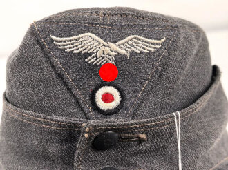 Luftwaffe, Feldmütze Modell 1943 für Mannschaften. Späte, " leichte " Ausführung. Leicht angeschmutzt, Kopfgrösse gemessen 54