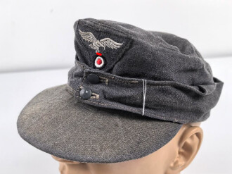 Luftwaffe, Feldmütze Modell 1943 für Mannschaften. Späte, " leichte " Ausführung. Leicht angeschmutzt, Kopfgrösse gemessen 54
