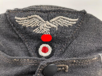 Luftwaffe, Feldmütze Modell 1943 für Mannschaften. Späte, " leichte " Ausführung. Leicht angeschmutzt, Kopfgrösse gemessen 54