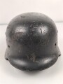 Luftwaffe, Stahlhelmglocke Modell 1935. Originallack, das Hakenkreuz passend zum Adler zu etwa 60-70% erhalten. SE66, ungereinigt