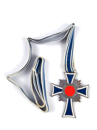 Ehrenkreuz der Deutschen Mutter in bronze, an langem Band. Nicht verausgabtes Stück, aus altem Bestand eines höchstwahrscheinlich Österreichischen Herstellers.