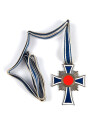 Ehrenkreuz der Deutschen Mutter in bronze, an langem Band. Nicht verausgabtes Stück, aus altem Bestand eines höchstwahrscheinlich Österreichischen Herstellers.