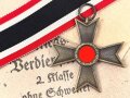 Kriegsverdienstkreuz 2. Klasse ohne Schwerter , kein Hersteller  im Bandring. Original verpackt,  In der zugehörigen Tüte, der Hersteller ausgeschnitten