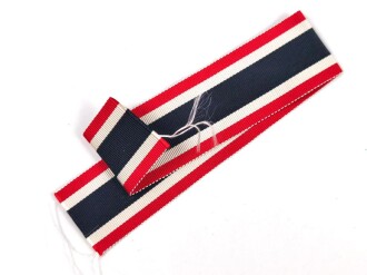 Kriegsverdienstkreuz 2. Klasse ohne Schwerter , kein Hersteller  im Bandring. Original verpackt,  In der zugehörigen Tüte, der Hersteller ausgeschnitten