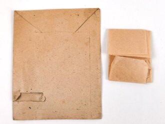 Kriegsverdienstkreuz 2. Klasse ohne Schwerter , kein Hersteller  im Bandring. Original verpackt,  In der zugehörigen Tüte, der Hersteller ausgeschnitten