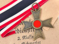 Kriegsverdienstkreuz 2. Klasse ohne Schwerter , kein Hersteller  im Bandring. Original verpackt,  In der zugehörigen Tüte, der Hersteller ausgeschnitten