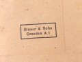 Kriegsverdienstkreuz 2. Klasse mit Schwertern , Hersteller "53" im Bandring für Glaser & Sohn Dresden. Ungetragenes Stück, in der originalen Verpackung und zugehörigen Tüte