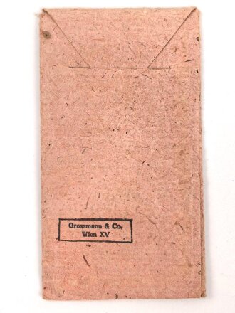 Medaille Winterschlacht im Osten, Hersteller 11 im Bandring  für Grossmann & Co. Wien. In der zugehörigen verleihungstüte