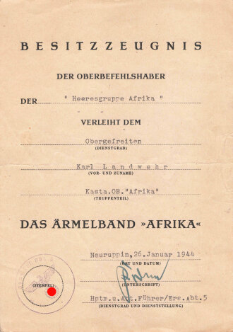 Besitzzeugnis eines Obergefreiten der Heeresgruppe Afrika für das Ärmelband Afrika, ausgestellt am 26. Januar 1944