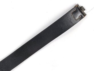 Koppel für Mannschaften des Heeres, das Schloss aus lackiertem Eisen in gutem Zustand, der Koppelriemen ebenfalls in gutem Zustand, Gesamtlänge 101cm, Koppel und Schloss datiert 1941