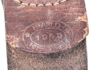 Koppel für Mannschaften des Heeres, das Schloss aus lackiertem Eisen datiert 1943, der Koppelriemen zugehörig mit einer Gesamtlänge von 88cm