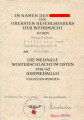 Verleihungsurkunde für die Medaille Winterschlacht im Osten 1941/42 an einen Obergefreiten, ausgestellt am 9.3.1944 bei Gebirgs Nachrichten Ersatz Abteilung 18