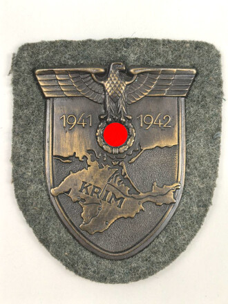 Krimschild, Eisen bronziert, Hersteller JFS 42, sehr guter Zustand, war mal auf einer Jacke vernäht