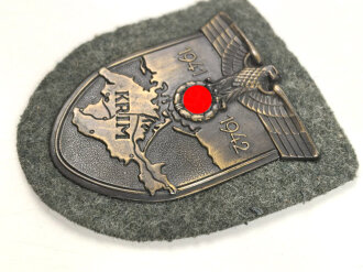 Krimschild, Eisen bronziert, Hersteller JFS 42, sehr guter Zustand, war mal auf einer Jacke vernäht