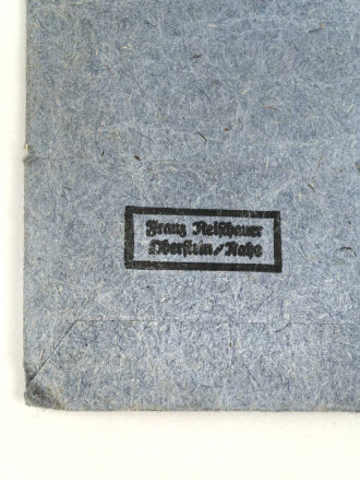 Eisernes Kreuz 2. Klasse 1939 , ungetragenes Stück, Band beiliegend, in Tüte von Franz Reischauer Oberstein / Nahe