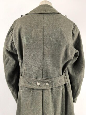 Heer, Mantel für Mannschaften, Kammerstück eines Herstellers aus Warschau. Die Ärmelaufschläge entfernt, auf dem Rücken die Buchstaben PG ( französischer Kriegsgefangener ) noch erkennbar . Stark getragenes Stück