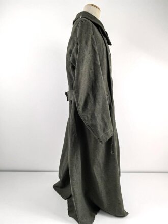 Heer, Mantel für Mannschaften, Kammerstück eines Herstellers aus Warschau. Die Ärmelaufschläge entfernt, auf dem Rücken die Buchstaben PG ( französischer Kriegsgefangener ) noch erkennbar . Stark getragenes Stück