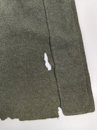 Heer, Mantel für Mannschaften, Kammerstück eines Herstellers aus Warschau. Die Ärmelaufschläge entfernt, auf dem Rücken die Buchstaben PG ( französischer Kriegsgefangener ) noch erkennbar . Stark getragenes Stück