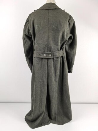 Heer, Mantel für Mannschaften, Kammerstück eines Herstellers aus Warschau. Die Ärmelaufschläge entfernt, auf dem Rücken die Buchstaben PG ( französischer Kriegsgefangener ) noch erkennbar . Stark getragenes Stück