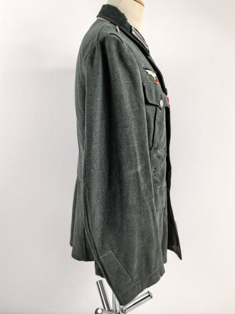 Heer, Feldbluse für Mannschaften Modell 1936. Stark getragenes Kammerstück, die Effekten neuzeitlich ergänzt