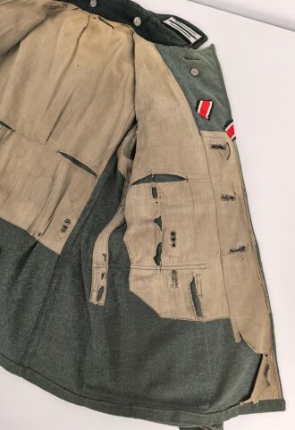 Heer, Feldbluse für Mannschaften Modell 1936. Stark getragenes Kammerstück, die Effekten neuzeitlich ergänzt