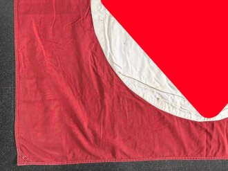 Ortsgruppe " Bruchsal" der NSDAP, große Fahne in nicht ganz vorschriftsmäßiger Ausführung. Deutliche Altersspuren, Maße 110 x 135cm