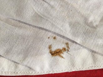 Ortsgruppe " Bruchsal" der NSDAP, große Fahne in nicht ganz vorschriftsmäßiger Ausführung. Deutliche Altersspuren, Maße 110 x 135cm