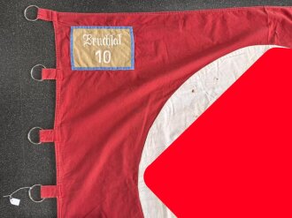 Ortsgruppe " Bruchsal" der NSDAP, große Fahne in nicht ganz vorschriftsmäßiger Ausführung. Deutliche Altersspuren, Maße 110 x 135cm