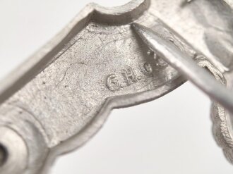 Adler für eine Schirmmütze des Heeres. Aluminium, ein Splint fehlt