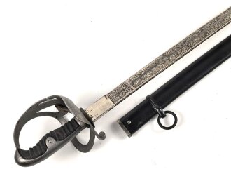 Preußen,  Kavallerie Säbel Modell 1852/ 79. Kammergestempeltes Stück mit beidseitiger Klingenätzung " Kurhess. Train Bataillon Nr.11" . Gefäß und Scheide gereinigt, leicht narbig, die Scheide neuzeitlich lackiert