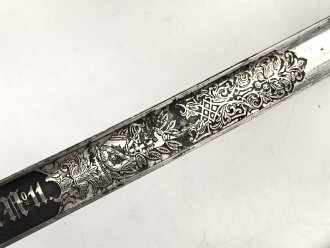 Preußen,  Kavallerie Säbel Modell 1852/ 79. Kammergestempeltes Stück mit beidseitiger Klingenätzung " Kurhess. Train Bataillon Nr.11" . Gefäß und Scheide gereinigt, leicht narbig, die Scheide neuzeitlich lackiert