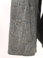 Heer, Feldbluse für Mannschaften Modell 1943. Getragenes Stück, die Kragenspiegel originalvernäht, der Brustadler könnte alt ergänzt sein, Kammerstempel siehe Foto