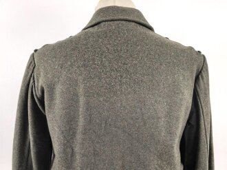 Heer, Feldbluse für Mannschaften Modell 1944. Getragenes Stück , die Effekten original vernäht