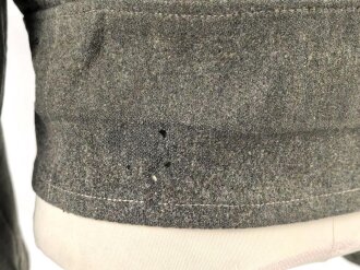 Heer, Feldbluse für Mannschaften Modell 1944. Getragenes Stück , die Effekten original vernäht