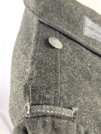 Heer, Feldbluse für Mannschaften Modell 1944. Getragenes Stück , die Effekten original vernäht