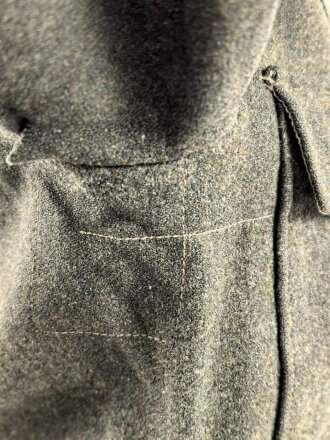 Heer, Feldbluse für Mannschaften Modell 1944. Getragenes Stück , die Effekten original vernäht