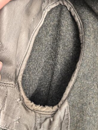 Heer, Feldbluse für Mannschaften Modell 1944. Getragenes Stück , die Effekten original vernäht