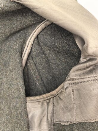 Heer, Feldbluse für Mannschaften Modell 1944. Getragenes Stück , die Effekten original vernäht