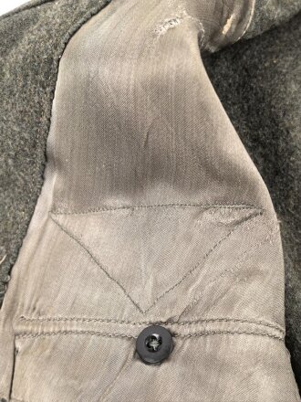 Heer, Feldbluse für Mannschaften Modell 1944. Getragenes Stück , die Effekten original vernäht