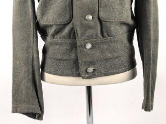 Heer, Feldbluse für Mannschaften Modell 1944. Getragenes Stück , die Effekten original vernäht