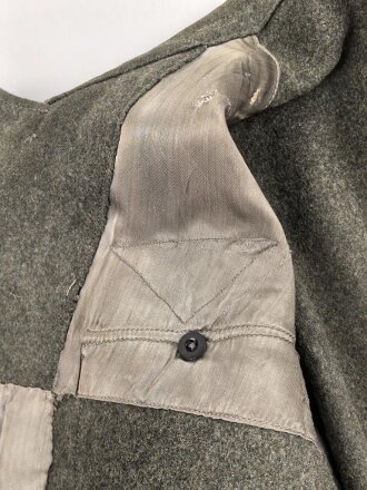 Heer, Feldbluse für Mannschaften Modell 1944. Getragenes Stück , die Effekten original vernäht