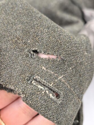 Heer, Feldbluse für Mannschaften Modell 1944. Getragenes Stück , die Effekten original vernäht