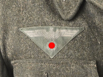 Heer, Feldbluse für Mannschaften Modell 1944. Getragenes Stück , die Effekten original vernäht