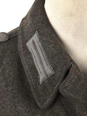 Heer, Feldbluse für Mannschaften Modell 1944. Getragenes Stück , die Effekten original vernäht