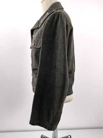 Heer, Feldbluse für Mannschaften Modell 1944. Getragenes Stück , die Effekten original vernäht