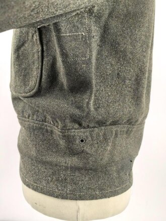 Heer, Feldbluse für Mannschaften Modell 1944. Getragenes Stück , die Effekten original vernäht